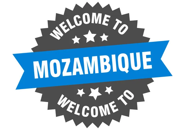 Segno del Mozambico. Benvenuti a adesivo blu Mozambico — Vettoriale Stock