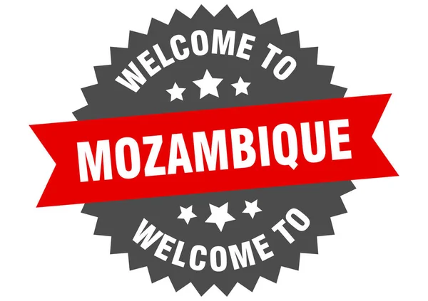Mozambique sign. welcome to Mozambique red sticker — Stock Vector