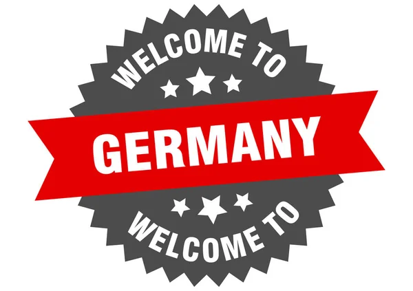 Firma in Germania. benvenuto in Germania adesivo rosso — Vettoriale Stock