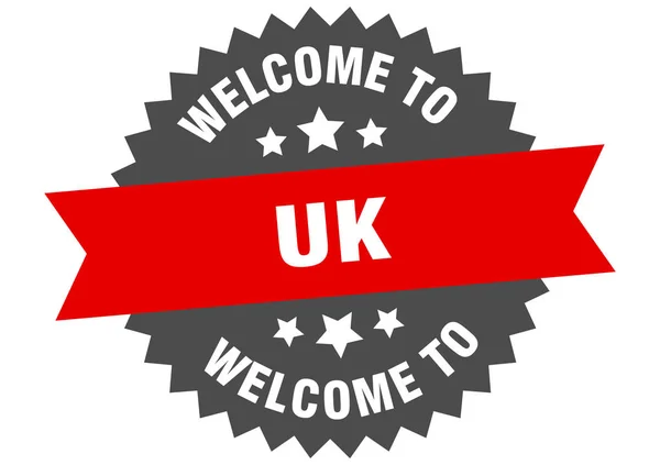 Firma uk. Bienvenido a Reino Unido etiqueta roja — Vector de stock