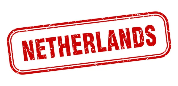 Nederland stempel. Nederland rood grunge geïsoleerd bord — Stockvector