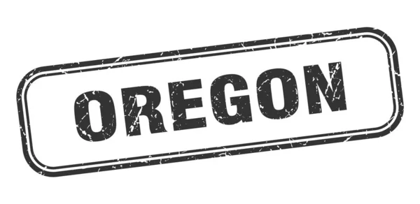 Timbre de l'Oregon. Oregon noir grunge isolé signe — Image vectorielle