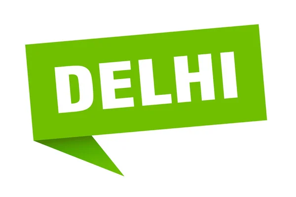 Delhi klistermärke. Grön Delhi skylt med pekare — Stock vektor