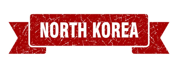 North Korea ribbon. Red North Korea grunge band sign — Stock Vector