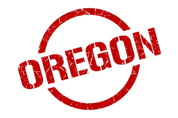 Timbre de l'Oregon. Oregon grunge rond isolé signe — Image vectorielle