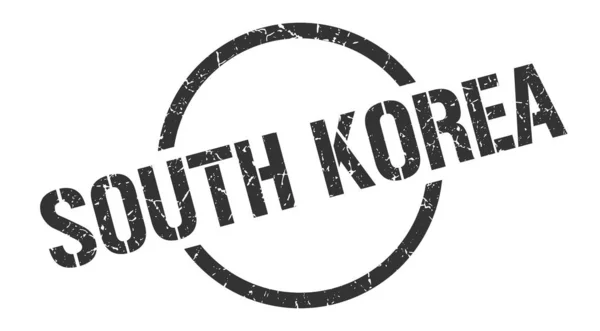 Stempel Korea Selatan. Korea Selatan grunge round tanda terisolasi - Stok Vektor