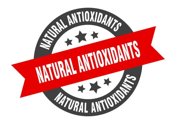 Doğal antioksidan işaretleri. Doğal antioksidan. Kurdele etiketi. Doğal antioksidan etiketi — Stok Vektör