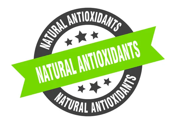 Природні антиоксиданти знак. натуральні антиоксиданти кругла стрічка наклейка. натуральні антиоксиданти мітка — стоковий вектор