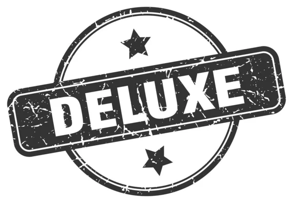Deluxe stamp. deluxe round vintage grunge sign. deluxe — Stock Vector