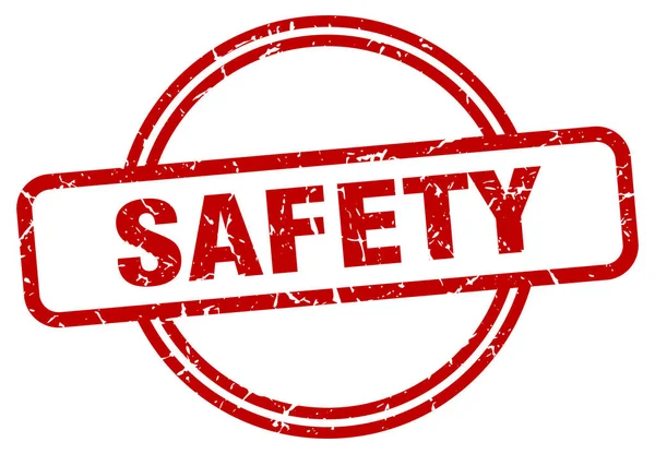 Safety stamp. safety round vintage grunge sign. safety — Stock Vector