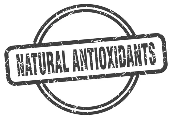 Natural antioxidants stamp. natural antioxidants round vintage grunge sign. natural antioxidants — 图库矢量图片