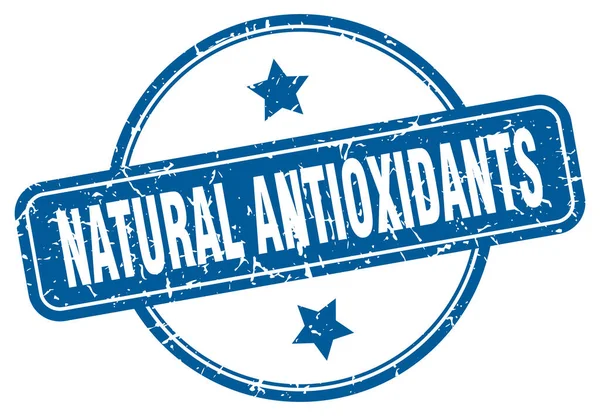 Натуральная марка антиоксидантов. натуральные антиоксиданты круглые винтажные гранж знак. природные антиоксиданты — стоковый вектор