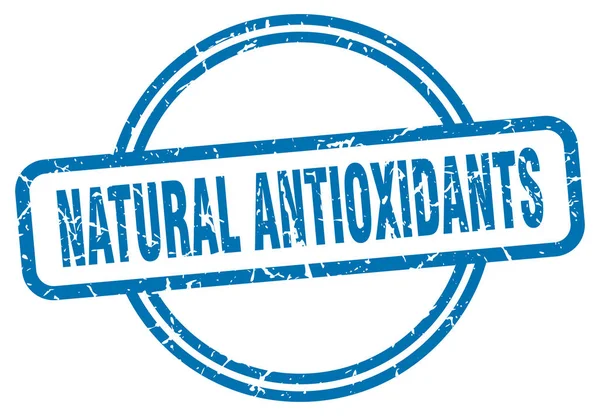 Timbro antiossidanti naturali. antiossidanti naturali segno grunge vintage rotondo. antiossidanti naturali — Vettoriale Stock