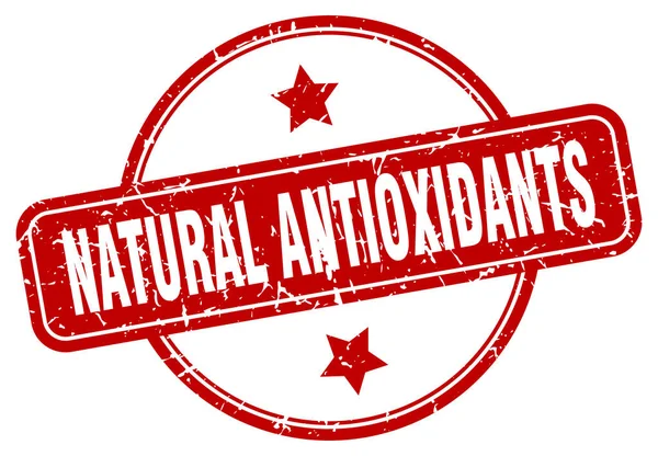 Natural antioxidants stamp. natural antioxidants round vintage grunge sign. natural antioxidants — Stok Vektör