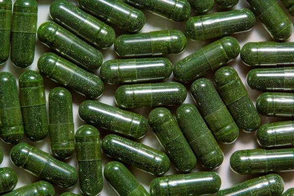 Chlorella Poeder Capsules Achtergrond Natuurlijke Groene Algen Supplement Pillen Alternatieve — Stockfoto