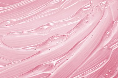 Pink gel texture. Cosmetic clear liquid cream smudge. Transparent skin care product sample closeup. Hand sanitizer, alcohol gel background clipart
