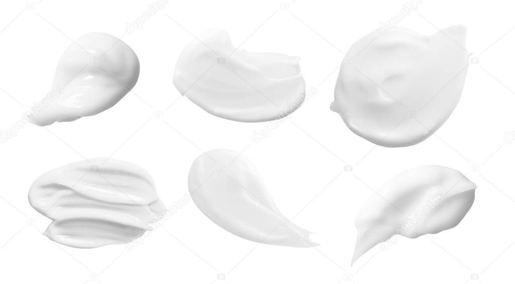 White beauty cream, lotion smears set. Cosmetic creme swatches isolated on white background. Skin care product smudge sample. Hand cream texture close up