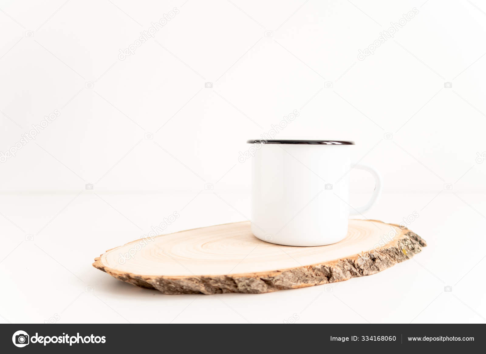 Download Enamel Mug Mock Up With Wooden Cut Tree Section On White Table Boho Design Of Tin Cup On White Background With Copy Space For Image Or Text Stock Photo Image By C