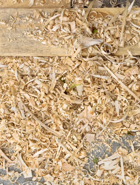 Fresh board and wood shavings — Stock Photo, Image