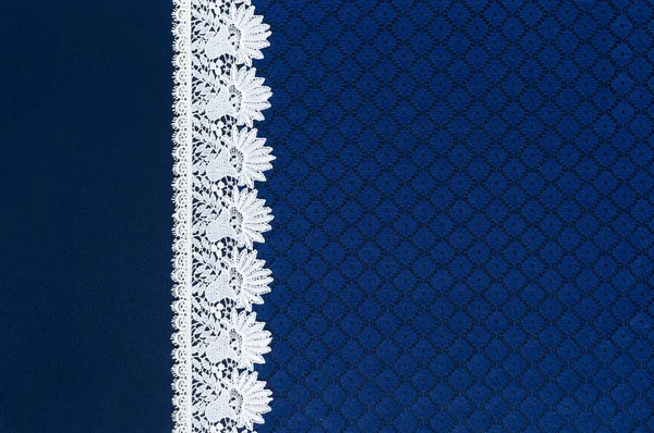 White lace on background blue guipure — Stock Photo, Image