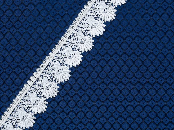 White lace on background blue guipure — Stock Photo, Image