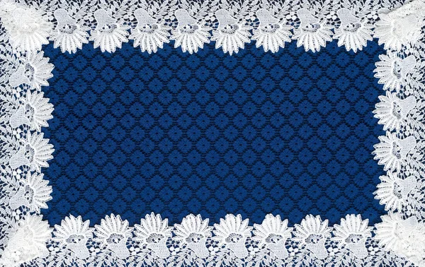 White lace on background blue guipure — Stock Photo, Image