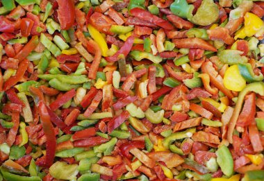 Buzlu donmuş sebzeler, renkli arka plan.