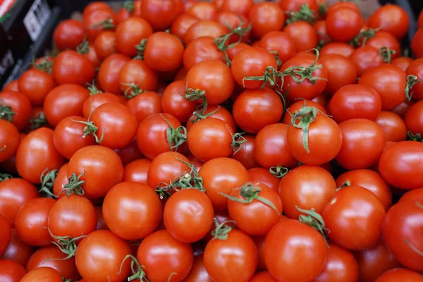 raw tomatoes on market show window, healthy food