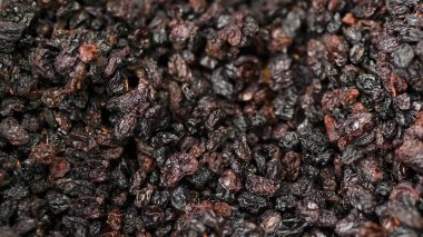 Üzüm üzümü dokusu olarak kuru üzümler. Süpermarkette kuru üzüm .