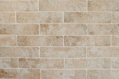 Dökülen alçı ve desenli eski, eski, kirli tuğla duvarın arka planı