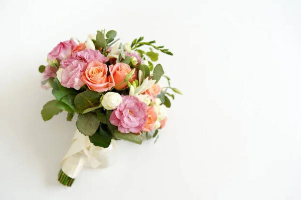 wedding bouquet with flowers roses on a white background with copy space. minimal concept. mockup