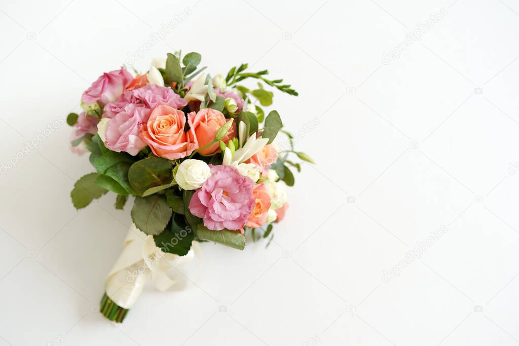 wedding bouquet with flowers roses on a white background with copy space. minimal concept. mockup