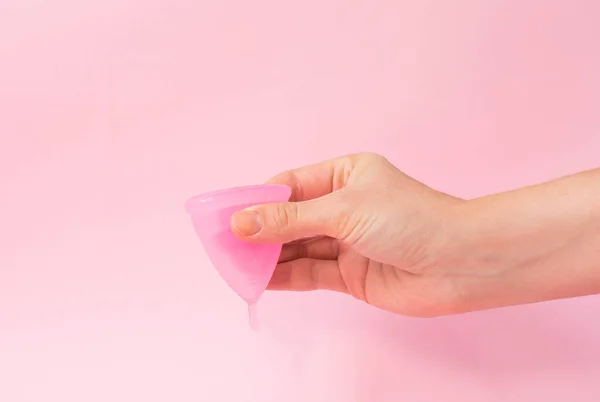 Young Woman Hand Holding Menstrual Cup Pink Background Copy Space — Stock Photo, Image
