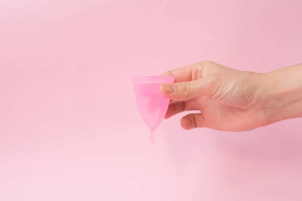 Woman Hand Folding Menstrual Cup Pink Background Copy Space — Stock Photo, Image