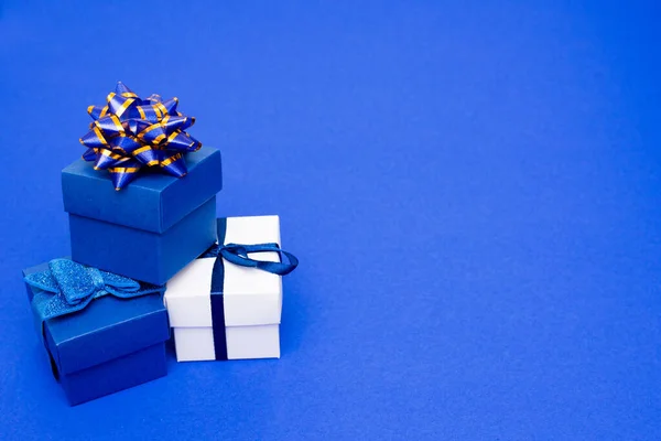 Gift Boxes Solid Classic Blue Background Holiday Gift Concept Copyspace — Stock Photo, Image