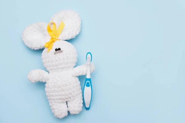Toy Bunny Toothbrush Blue Background Copy Space — Stock Photo, Image