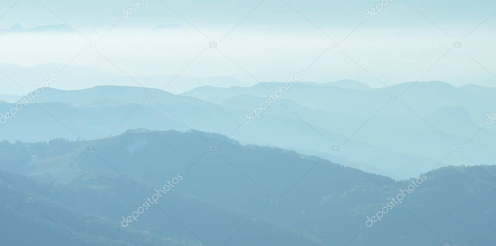 The beautiful scenery of mountains range view from above Elbrus.