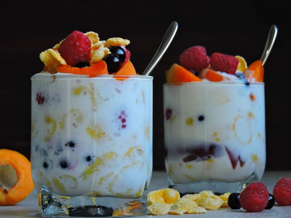 Fruit and cereal with yogurt. Concept of a healthy dessert.