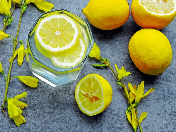 Detox Water Lemon Juice Lemon Water Yellow Flowers Branches Water — Stock Photo, Image