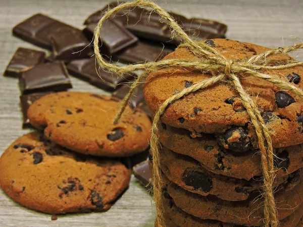 Chocolate biscuits with chocolate drops and pieces of dark chocolate.