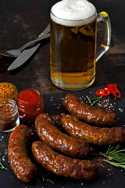 Grilled Sausages Dark Stone Board Glass Beer Juicy Delicious Fried — Stock Photo, Image