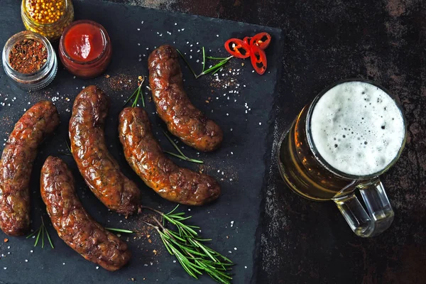 Grilled Sausages Dark Stone Board Glass Beer Juicy Delicious Fried — Stock Photo, Image