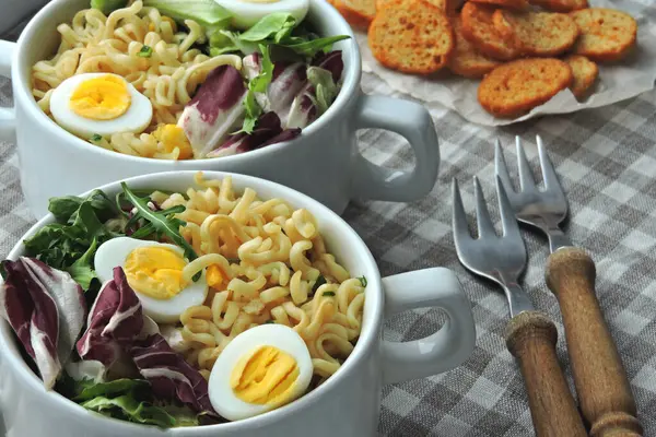 Noodles with salad and quail eggs. Healthy food. Diet food. — Stock Image Noodles Salad Quail Eggs Healthy Food Diet Food Royalty Free Stock Images