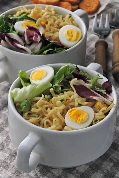 Noodles with salad and quail eggs. Healthy food. Diet food. — Stock Image Noodles Salad Quail Eggs Healthy Food Diet Food Royalty Free Stock Images