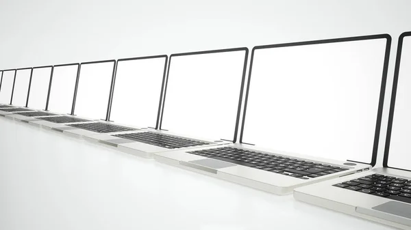 Mehrere Laptops auf weißer Oberfläche - 3D-Rendering — Stockfoto