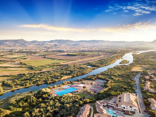 Tourist village near the river Coghinas in Sardinia taken from t — Stock Photo, Image