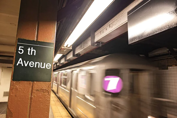 Fifth Avenue subway sign in New York City Manhattan station