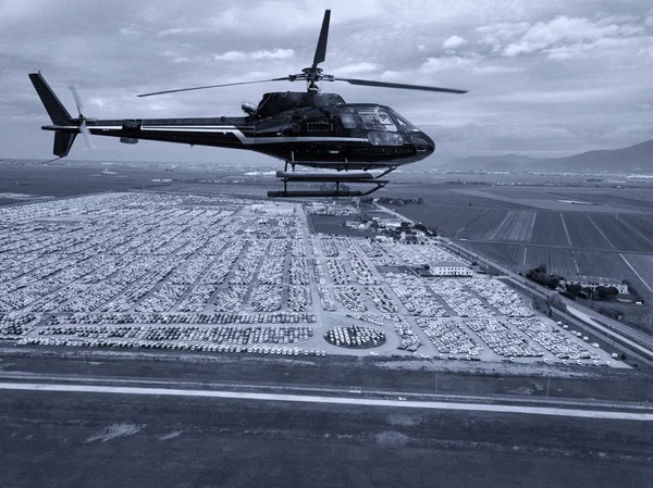 Helicopter flight over customs car parcking — Stock Photo, Image