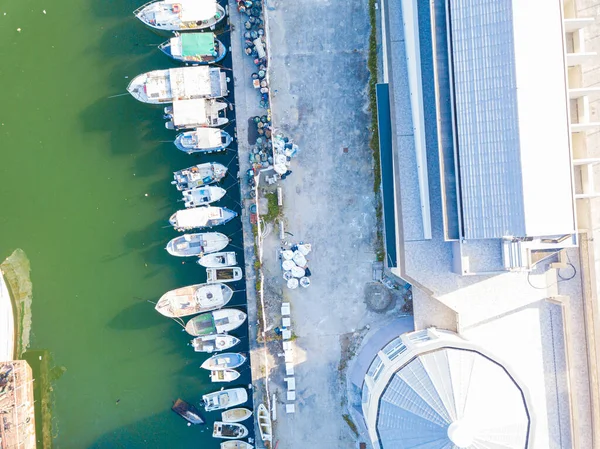 Aerial view of the port with small fishing boats at the evening — Stock Photo, Image