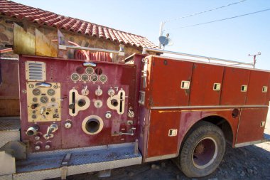 Old fire truck in Death Valley. clipart